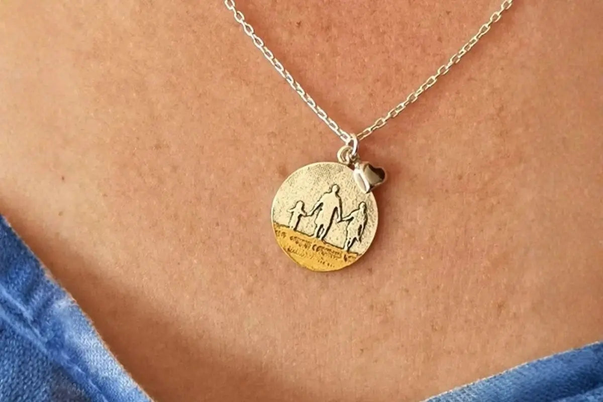Family silhouette necklace capturing a moment of connection