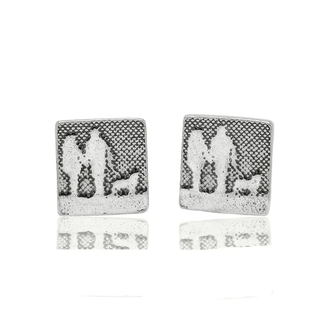 Round sterling silver stud earrings etched with a couple walking hand in hand with their dog.