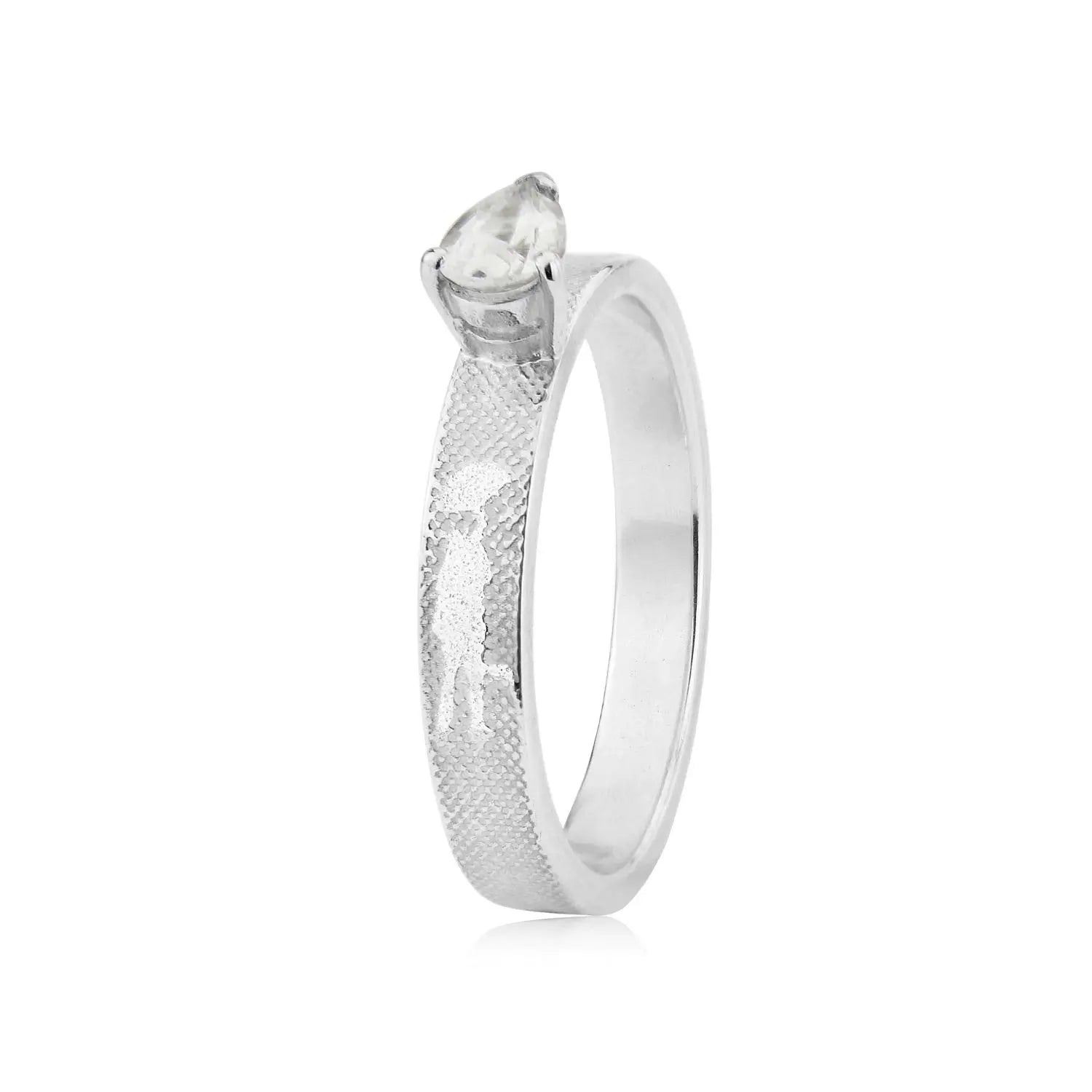 Unique engagement ring with 0.40ct pear diamond and Dancing in the Rain silhouette artwork.