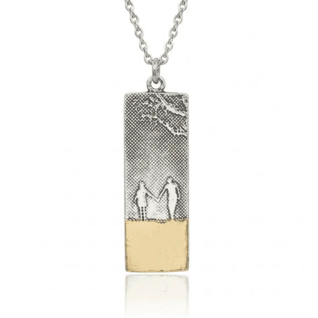 Hand in Hand Beach Memories Necklace showing two figures walking hand in hand along the shoreline, etched into sterling silver and finished with 22ct gold vermeil.
