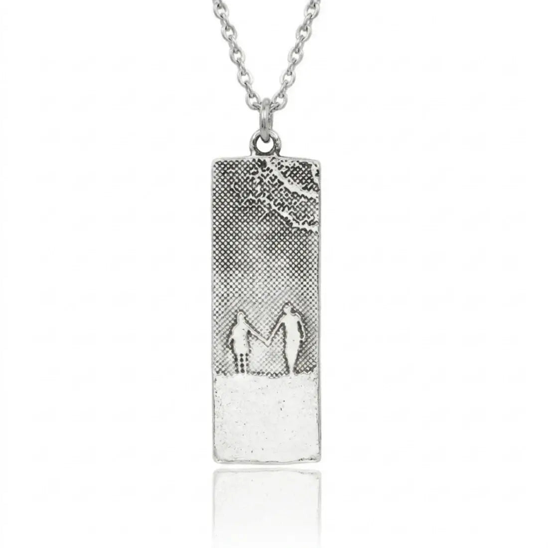 Hand in Hand Couple Necklace showing the polished sterling silver silhouette detail.