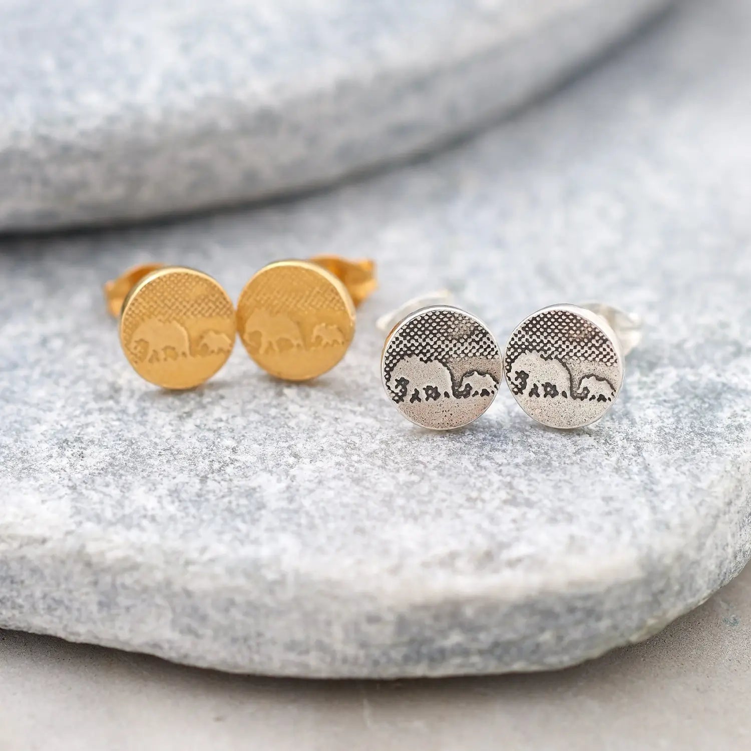 Sterling silver mother and baby elephant stud earrings alongside gold vermeil version.
