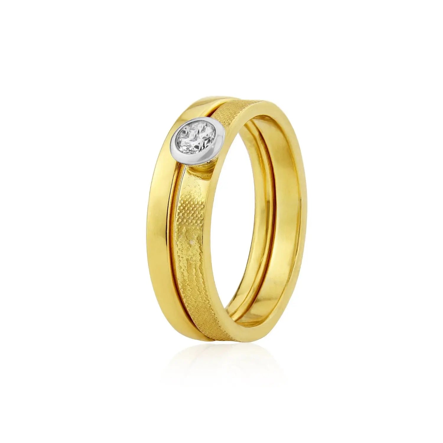 Yellow gold engagement ring with diamond paired with Sunset Couple silhouette wedding band