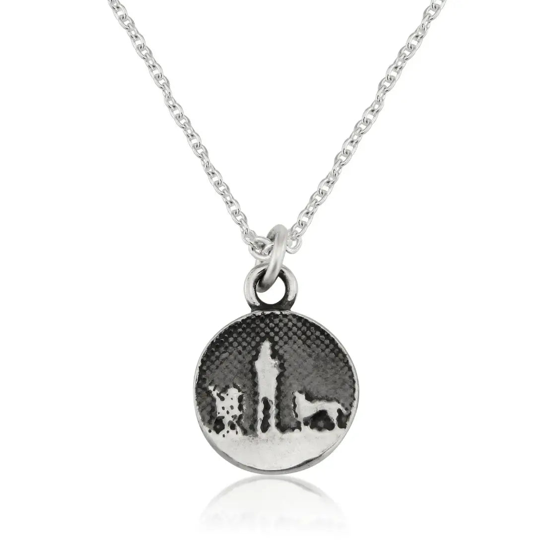 Walks Under Night’s Sky Silver Dog Charm displayed on a silver chain, showing a small round charm etched with an owner and two dogs beneath an oxidised night sky, featuring two silver dogs.