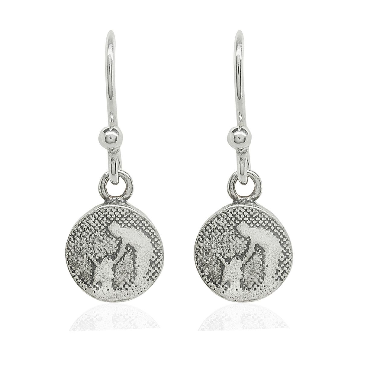 Small round silver drop earrings etched with a dog and owner sharing a quiet moment together.