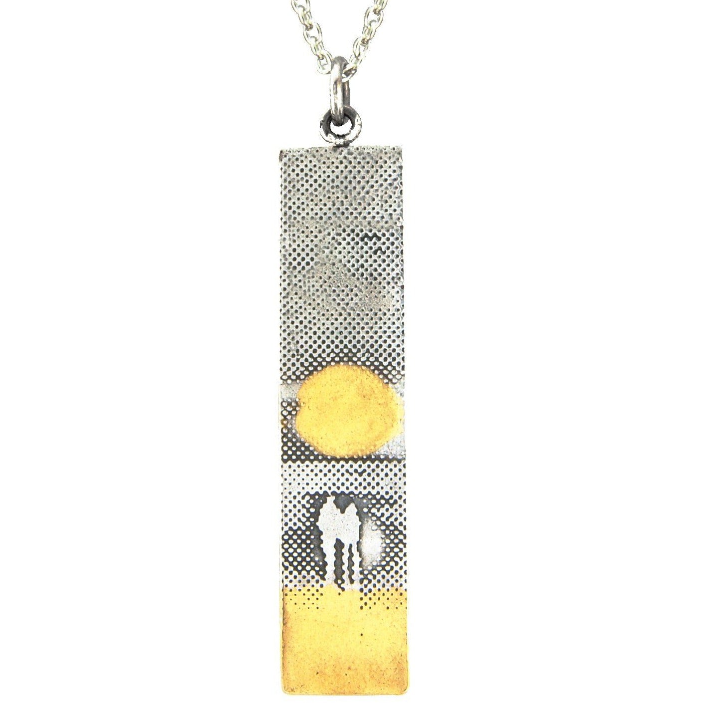 Close‑up detail of the Sunset Couple Memory Necklace showing sterling silver silhouette and gold vermeil highlights.