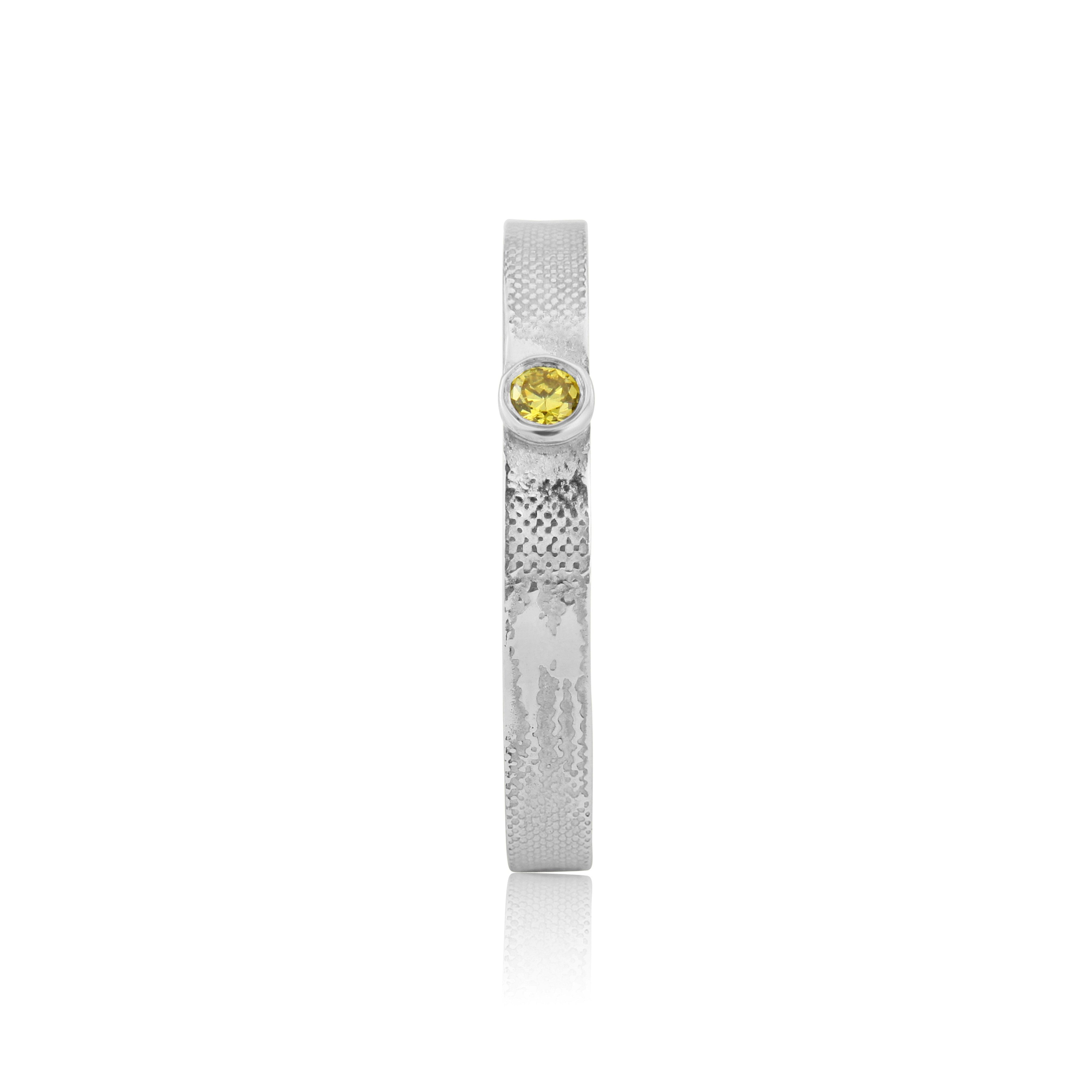 Unique diamond wedding ring with Sunset Couple silhouette in white gold by Charlotte Lowe.