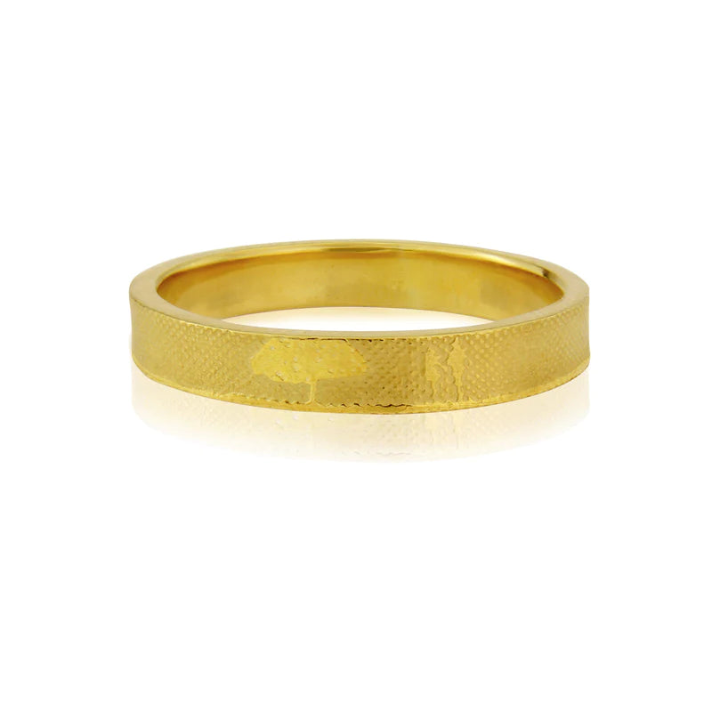 Unique yellow gold wedding ring with countryside couple silhouette by Charlotte Lowe