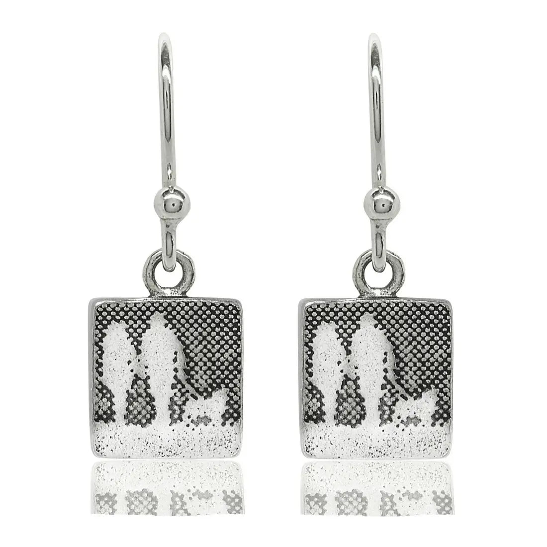 Sterling silver drop earrings etched with a couple walking hand in hand with their dog.