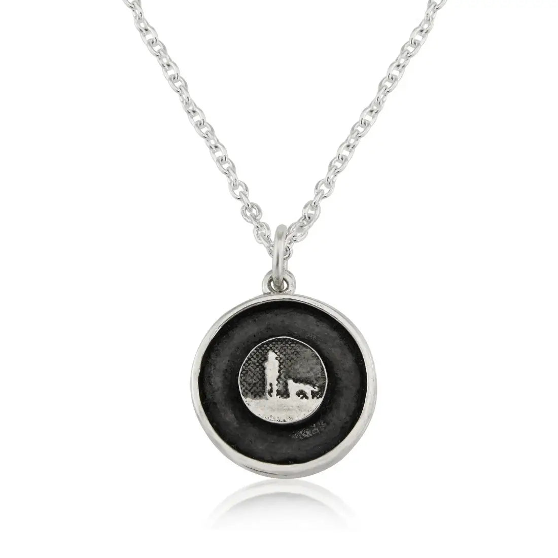Sterling silver dog lovers locket with standing silhouette and a black oxidised sky finish, shown closed with etched detail.