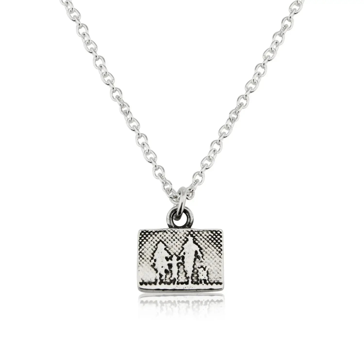 Little Dog Lovers Family Necklace featuring a petite sterling silver pendant etched with a family of three walking with their dog, shown in a rectangular silhouette with oxidised detail.