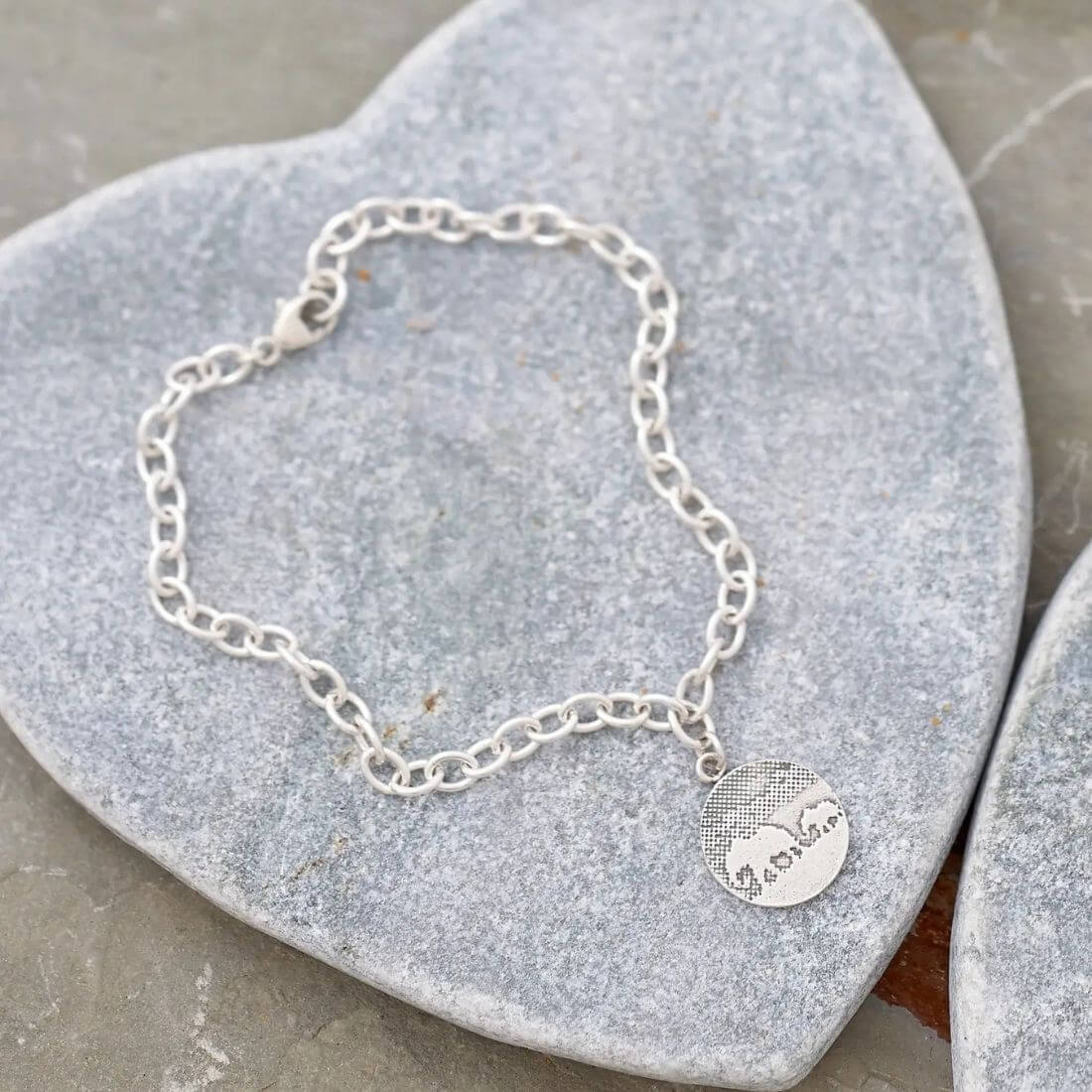 Flatlay of Mother and Baby Elephant Bracelet.
