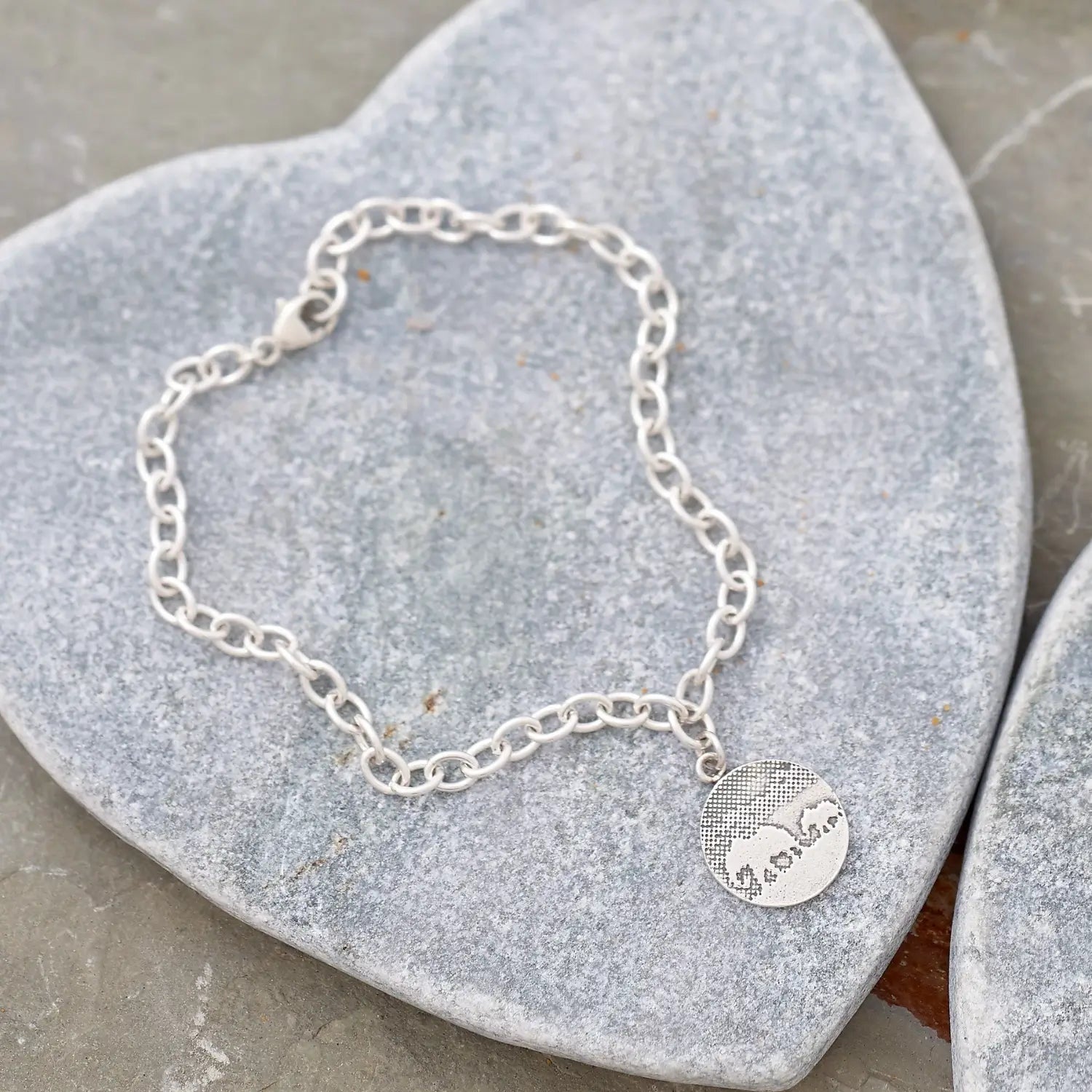 Flatlay of Mother and Baby Elephant Bracelet.