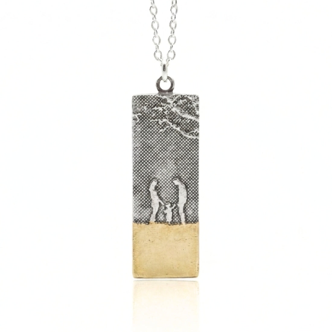 Our Little Family Beach Memories Necklace featuring a mother, father and child silhouette with 22ct gold vermeil beach finish.