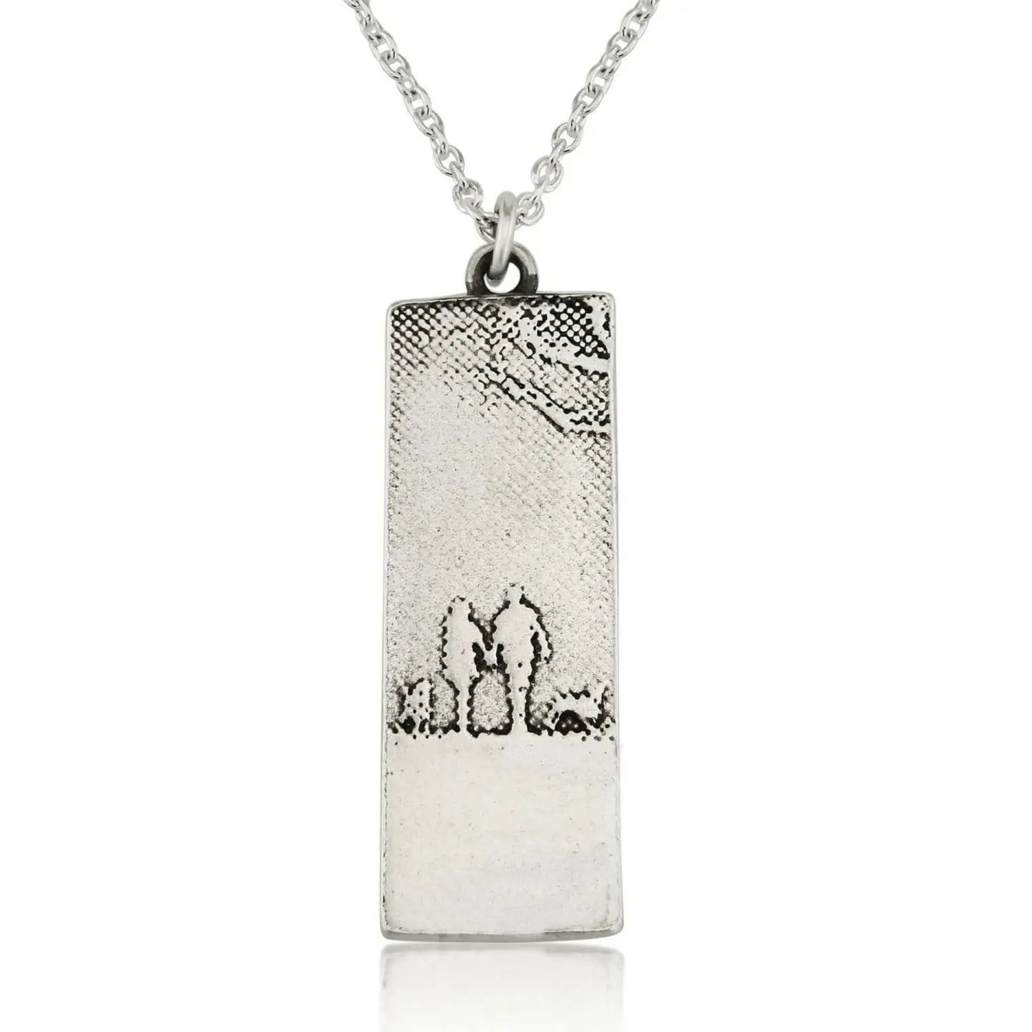 Sterling silver couple and two dogs necklace inspired by peaceful countryside walks, showing the silhouette design with oxidised detail.