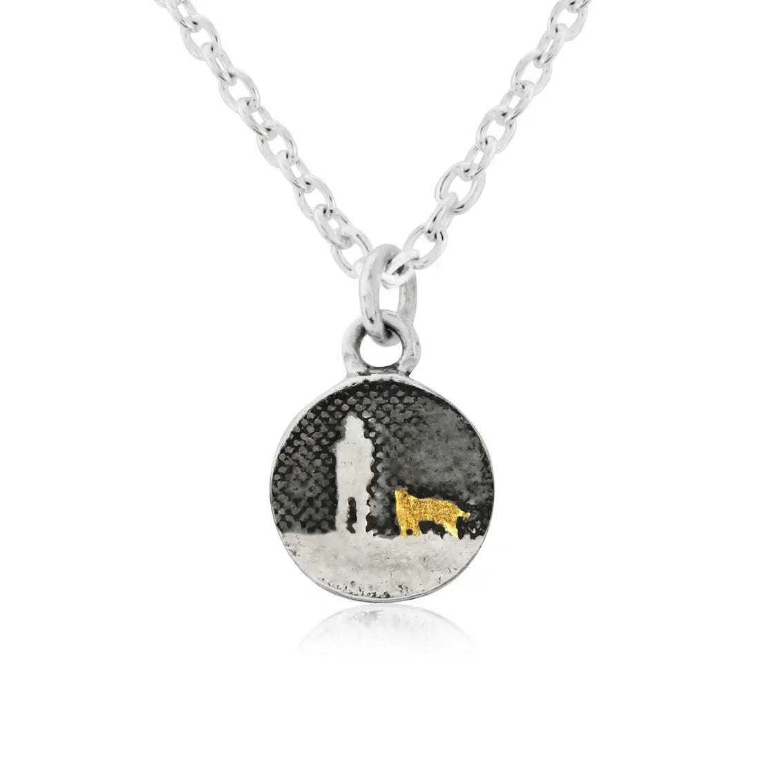 Walks Under Night’s Sky Gold Dog Charm displayed on a silver chain, showing a small round charm etched with an owner and their dog beneath an oxidised night sky, featuring a single 22ct gold vermeil dog.