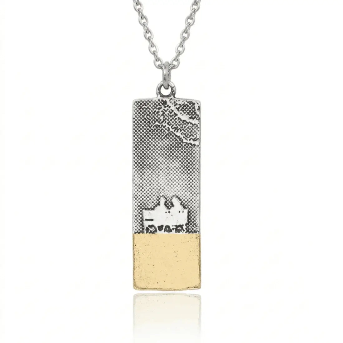 With you beach memory beach necklace featuring two people sat on the a bench by the coast, finished with 22ct gold vermeil to represent the sand.