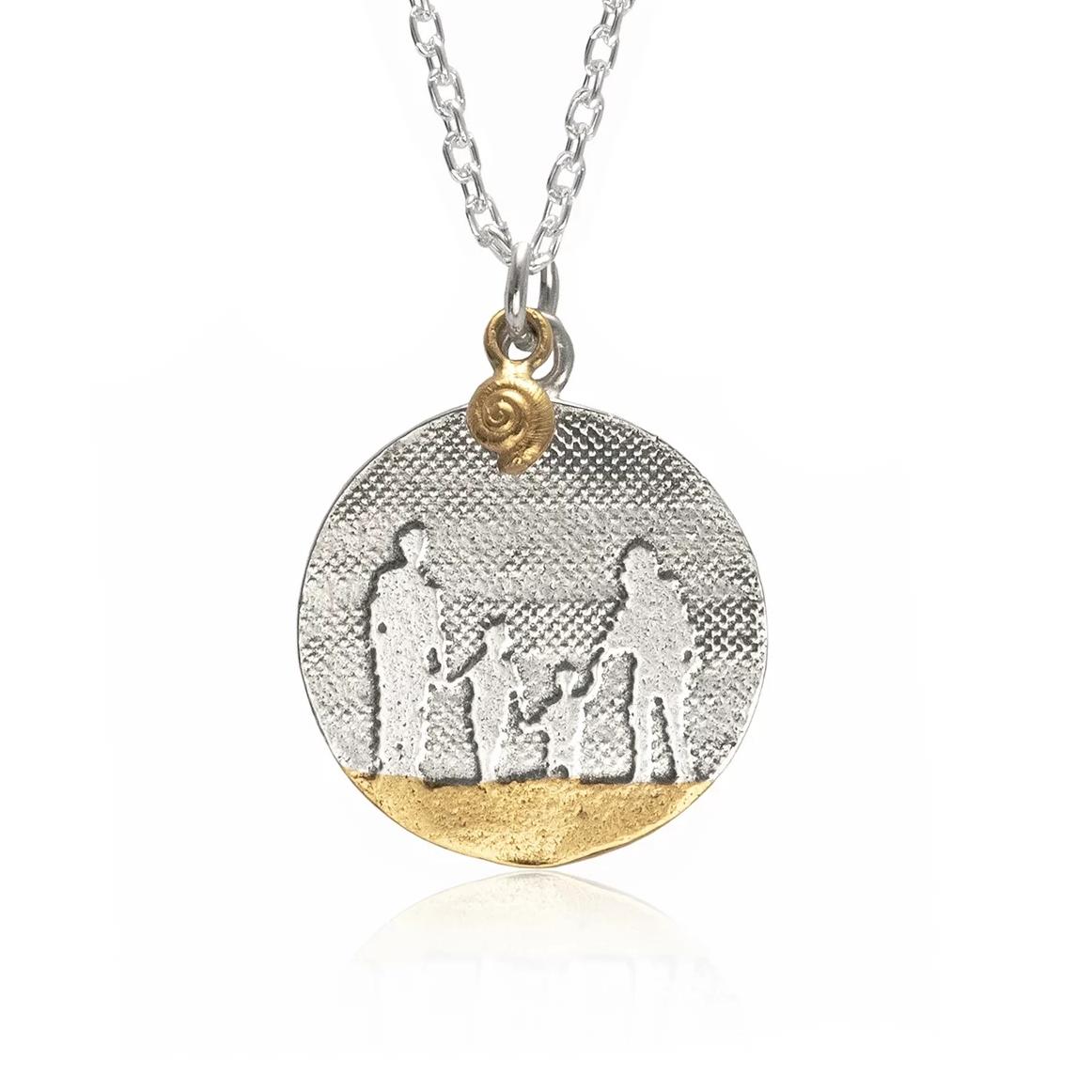Round Beach Memories Family Necklace showing a family of four walking on golden sand.