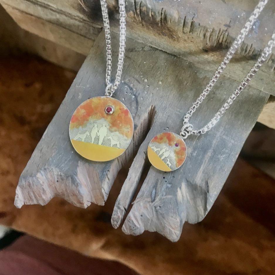Sterling silver personalised dog lovers necklace designed with custom etched figures and optional gold vermeil or enamel sky finishes.