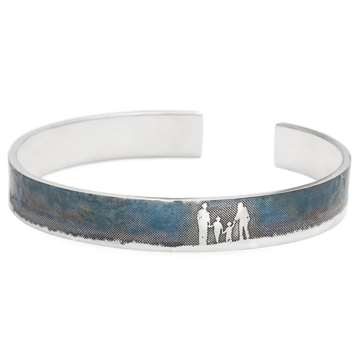 Family Bangle with Blue Sky showing a family of four walking side by side.