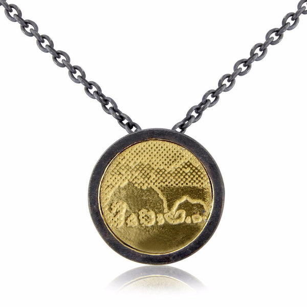 Gold Elephant Necklace with black/silver frame