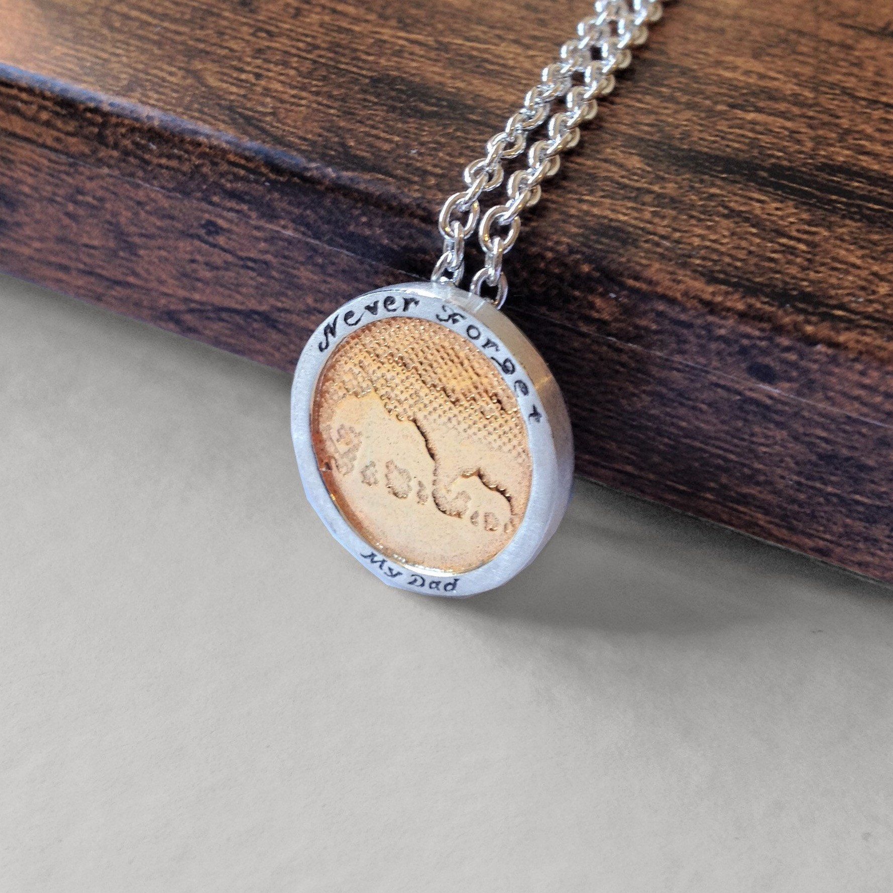 Gold Elephant Necklace with black/silver frame