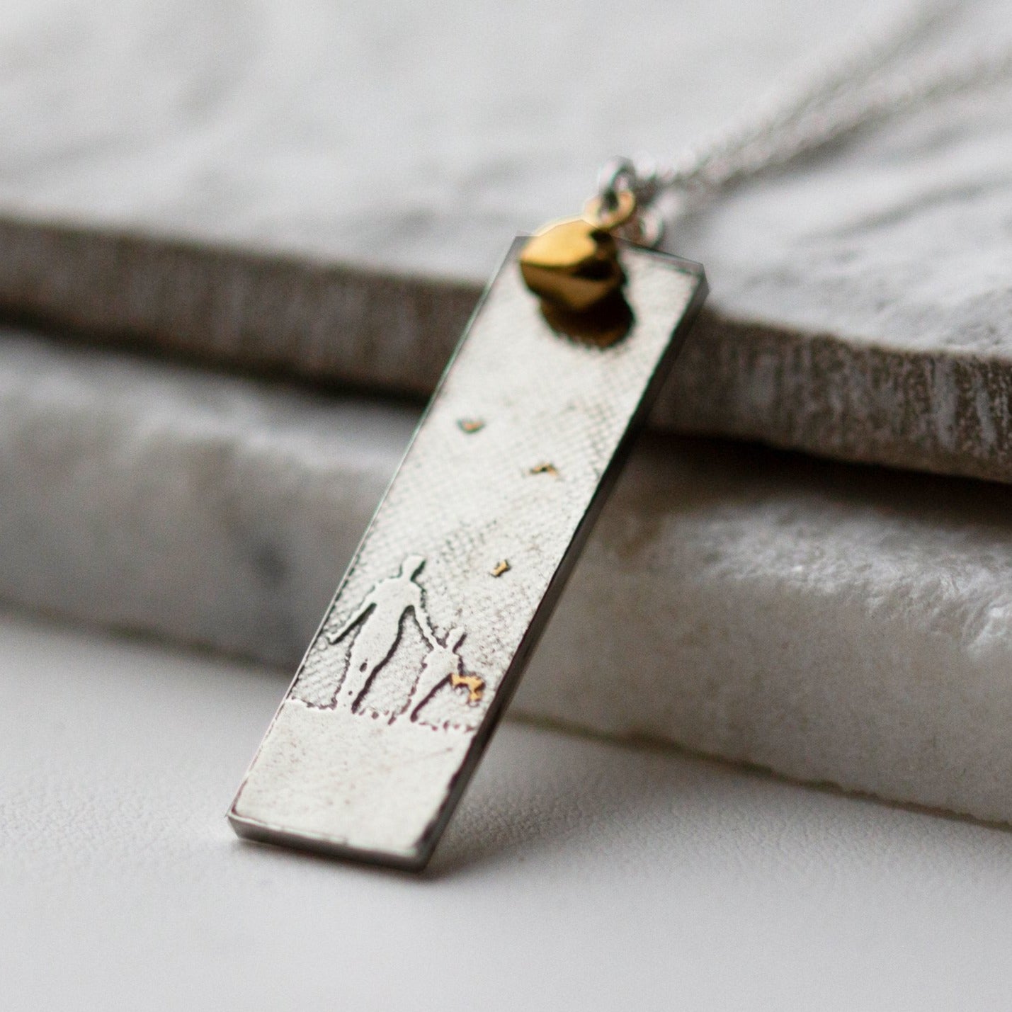 Mother and Child Heart Charm Necklace with golden details