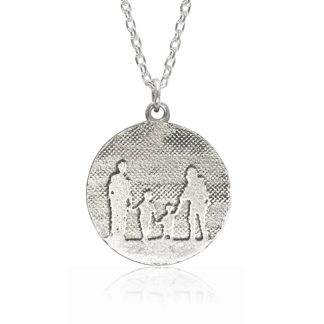 Round Silver Family Necklace showing a family of four etched in sterling silver