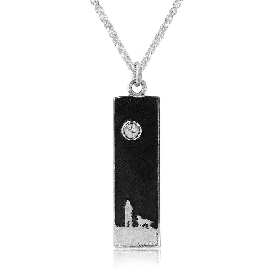 Sterling silver rectangular dog lovers necklace showing two figures side by side beneath a white sapphire moon and night sky.