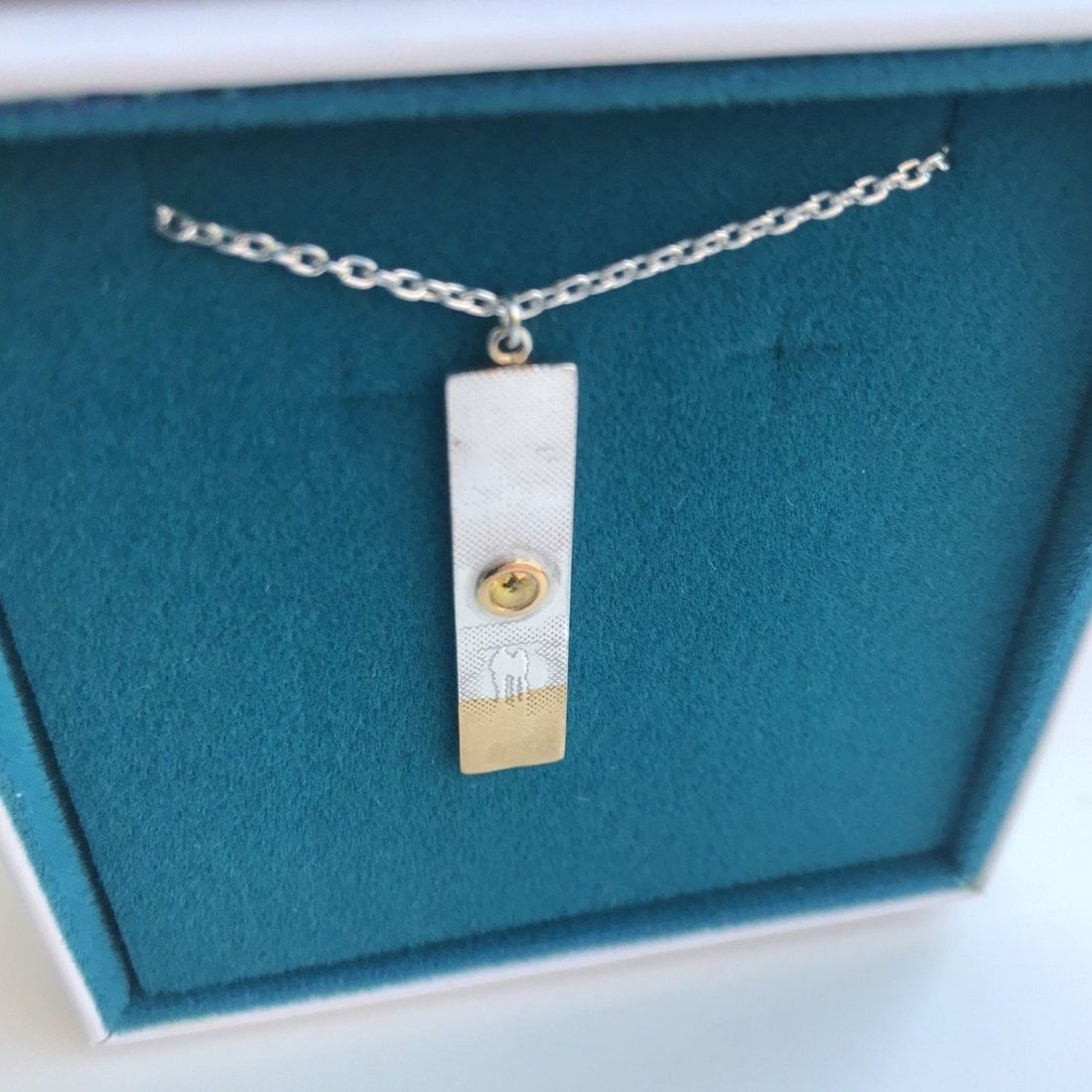 Sunset Necklace with Stunning Yellow Sapphire Sunshine in blue and white box.